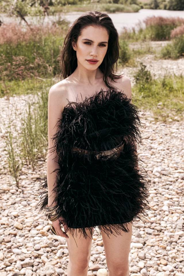 OMRA feathers dress featured in Marie Claire Magazine