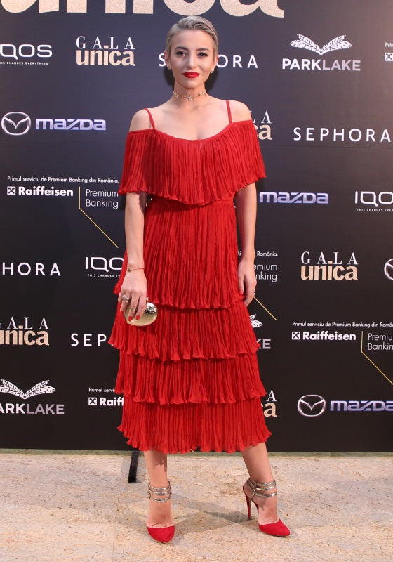 Giulia Anghelescu wearing OMRA red silk Positano dress at UNICA Magazine Event